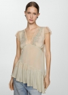 Mango Blusa asimétrica bordada - Crudo