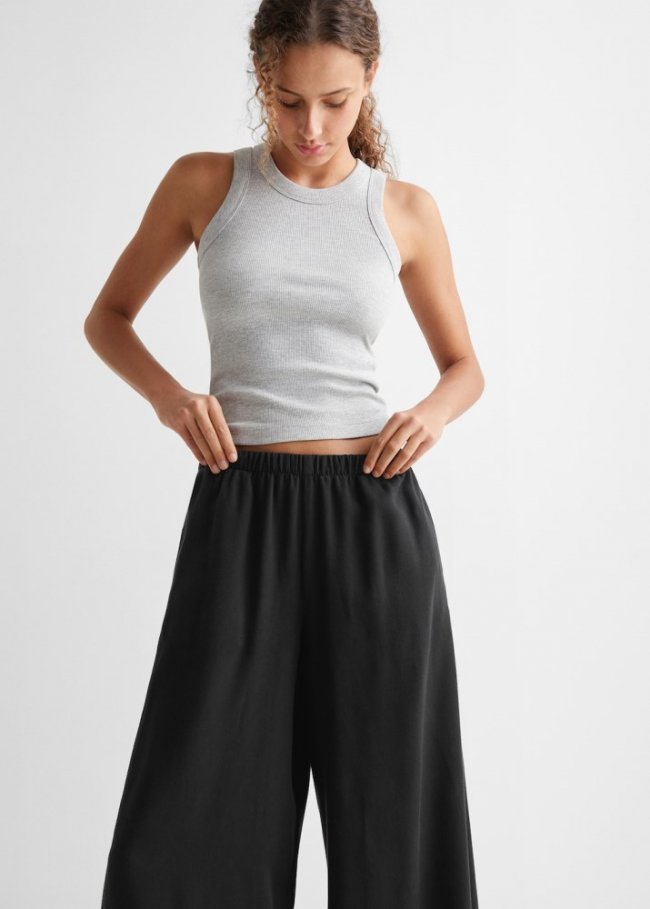 Mango Pantalón palazzo fluido - Negro